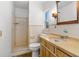 Bathroom featuring a shower, toilet, and vanity with a sink at 191 Howes St, Oak Hill, FL 32759