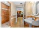 Bathroom featuring tiled floors, and shower in view from the door at 191 Howes St, Oak Hill, FL 32759