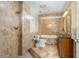 Bathroom featuring tiled shower, soaking tub, vanity, and classic fixtures at 191 Howes St, Oak Hill, FL 32759