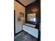 Modern bathroom with a large vanity and decorative accents at 1948 Spruce Creek Lndg, Port Orange, FL 32128