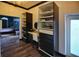 Bedroom closet featuring vanity with shelves and natural lighting at 1948 Spruce Creek Lndg, Port Orange, FL 32128