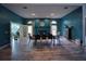 Large dining room provides seating for six, accent wall, fireplace and access to study at 1948 Spruce Creek Lndg, Port Orange, FL 32128