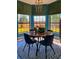 Dining room features bay windows and seating for four at 1948 Spruce Creek Lndg, Port Orange, FL 32128
