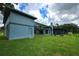 Lush backyard view of the home at 1948 Spruce Creek Lndg, Port Orange, FL 32128