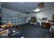 Spacious garage featuring ample storage, shelving units and work space at 1948 Spruce Creek Lndg, Port Orange, FL 32128