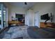 Comfortable living room with tile floors, fan, and access to outdoor space and dining room at 1948 Spruce Creek Lndg, Port Orange, FL 32128