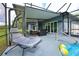 Comfortable patio seating area with stylish furniture and view of backyard, perfect for outdoor relaxation at 1948 Spruce Creek Lndg, Port Orange, FL 32128