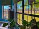 Window showing landscape with palm trees at 1948 Spruce Creek Lndg, Port Orange, FL 32128