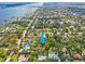 An aerial view of the property, showcasing water views, and neighborhood at 20 Warwick Ave, Ormond Beach, FL 32174