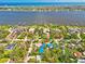 An aerial view of the property showcasing its proximity to the waterfront and surrounding neighborhood at 20 Warwick Ave, Ormond Beach, FL 32174