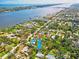 An aerial view of the property, showcasing water views, and neighborhood at 20 Warwick Ave, Ormond Beach, FL 32174