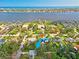 An aerial view of the property showcasing its proximity to the waterfront and surrounding neighborhood at 20 Warwick Ave, Ormond Beach, FL 32174