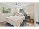 Cozy bedroom featuring hardwood floors, neutral walls, and lots of natural light from two windows at 20 Warwick Ave, Ormond Beach, FL 32174