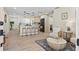 Open concept living room and kitchen with hardwood floors at 20 Warwick Ave, Ormond Beach, FL 32174