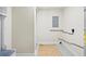 Mud room area with storage bench, tile floor, and convenient access to utilities at 20 Warwick Ave, Ormond Beach, FL 32174
