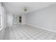 Dining room with tile flooring, ceiling fan, and access to the lanai at 2211 Brian Ave, South Daytona, FL 32119