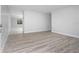 Open-concept living area featuring new floors and neutral wall colors at 2211 Brian Ave, South Daytona, FL 32119