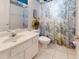 Bathroom showcasing toilet and vanity with patterned shower curtain adding style at 2307 Needle Palm Dr, Edgewater, FL 32141
