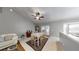 Inviting dining room with tile floors, seating for six, and sliding glass doors to the backyard at 2307 Needle Palm Dr, Edgewater, FL 32141