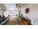 Spacious Florida room filled with furniture, leading to screened pool with views of the backyard at 2307 Needle Palm Dr, Edgewater, FL 32141