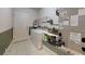 Laundry room with a washer, dryer, and utility sink, plus storage space for added convenience at 2307 Needle Palm Dr, Edgewater, FL 32141