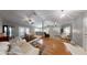 Open concept living space connecting living room and dining area for easy entertaining at 2307 Needle Palm Dr, Edgewater, FL 32141