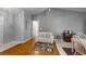 Cozy living room with hardwood floors that connect to the dining area at 2307 Needle Palm Dr, Edgewater, FL 32141