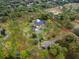 Aerial view of a wooded property showcasing the home's location within a generous land parcel at 2333 Southern Pines Pl, Deland, FL 32724