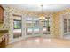 Breakfast nook featuring French doors opening to the pool area at 2333 Southern Pines Pl, Deland, FL 32724