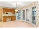 Charming breakfast nook with built-in desk area and pool view at 2333 Southern Pines Pl, Deland, FL 32724