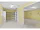 Garage with lots of space, neutral flooring, and big windows for natural light at 2333 Southern Pines Pl, Deland, FL 32724