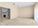 Large room with a built-in fireplace and shelving, and access to the exterior through large glass windows at 2333 Southern Pines Pl, Deland, FL 32724