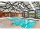 Indoor pool with ample space and great lighting at 2333 Southern Pines Pl, Deland, FL 32724