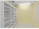This room has large built-in shelves and neutral flooring, offering versatile storage solutions at 2333 Southern Pines Pl, Deland, FL 32724
