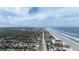 Beautiful aerial view of the beach and the city with points of interest labeled at 2401 S Atlantic Ave # A604, New Smyrna Beach, FL 32169