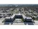 Aerial view of oceanfront condos with multiple pools at 2401 S Atlantic Ave # A604, New Smyrna Beach, FL 32169