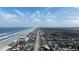 Beautiful aerial view of the beach and the city at 2401 S Atlantic Ave # A604, New Smyrna Beach, FL 32169