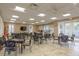 Large meeting room with tables and chairs for events or community gatherings at 2401 S Atlantic Ave # A604, New Smyrna Beach, FL 32169