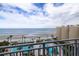 Beautiful oceanfront view from a balcony overlooking the pool and beach at 2401 S Atlantic Ave # A604, New Smyrna Beach, FL 32169