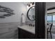 Charming half bath with modern vanity and decor at 2401 S Atlantic Ave # D301, New Smyrna Beach, FL 32169