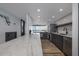 Bright kitchen featuring stainless steel appliances, a marble countertop, and scenic views at 2401 S Atlantic Ave # D301, New Smyrna Beach, FL 32169