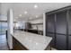 This remodeled kitchen features granite countertops, stainless appliances and coastal views at 2401 S Atlantic Ave # D301, New Smyrna Beach, FL 32169