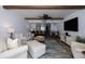 Spacious living room showcasing an open floor plan with kitchen and ocean views at 2401 S Atlantic Ave # D301, New Smyrna Beach, FL 32169