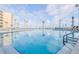 Cool off in the beautiful pool with the ocean and blue skies as your backdrop at 2401 S Atlantic Ave # D301, New Smyrna Beach, FL 32169