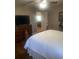 Bedroom with hardwood floors, neutral walls, and a view of a doorway to the rest of the house at 2409 Victory Palm Dr, Edgewater, FL 32141
