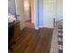Bedroom featuring hardwood floors, closet, and desk at 2409 Victory Palm Dr, Edgewater, FL 32141