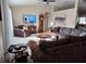 Inviting living room with a neutral palette, comfortable furniture, and a well-placed entertainment center at 2409 Victory Palm Dr, Edgewater, FL 32141