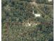 Expansive property with lush surrounding nature as seen in this aerial view at 2576 Shilo Glynn Ln, New Smyrna Beach, FL 32168