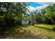View of the backyard surrounded by lush greenery at 2576 Shilo Glynn Ln, New Smyrna Beach, FL 32168