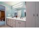 Stylish bathroom with a double vanity, updated lighting, and neutral color tones for a spa-like feel at 2576 Shilo Glynn Ln, New Smyrna Beach, FL 32168
